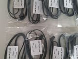 several different types of cables are wrapped in plastic bags on a table