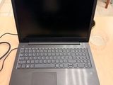 a laptop that is sitting on a table in a room