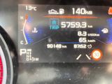 a close up of a car ' s dashboard with a speedometer