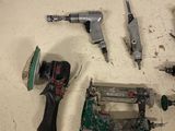 a lot of tools that are sitting on a table