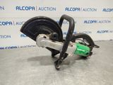 a close up of a circular cutter on a metal surface
