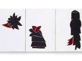 three panels of black and red artwork on a white wall