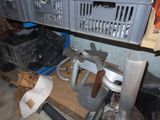 a pile of assorted items sitting on the floor