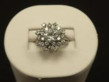 an image of a diamond ring in a display case