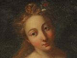 portrait of a young girl with a basket of flowers in her hand