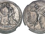 a silver coin with a man on it and a woman on the other side