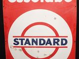 un panneau rouge et blanc sur lequel est inscrit « essolube »