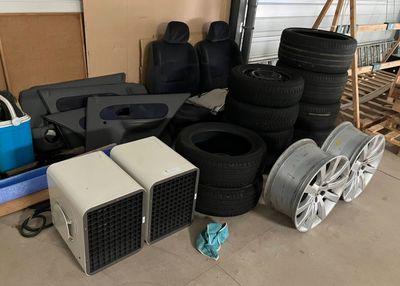 a lot of tires and other items in a garage