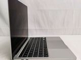 a laptop computer sitting on a table with a white background