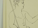 a black and white drawing of a man sitting on a chair