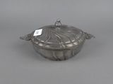 an antique silver plate covered dish with a lid