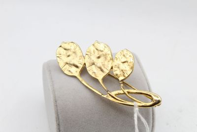 MATHIEU NANCY broche en métal doré L.