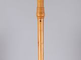 an image of a bamboo flute on a marble base