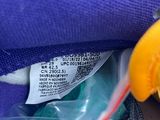 a bird that is sitting inside of a blue bag