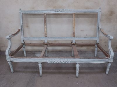 a white couch that is sitting in a room