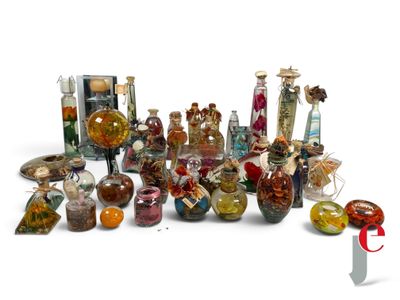 a lot of glass bottles that are sitting on a table