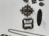 a lot of silver items that are on a table