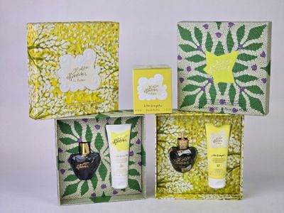 a group of three boxes that have different items in them