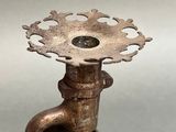 an image of a metal object that is on top of a table
