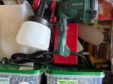 a pile of assorted items sitting on top of a table