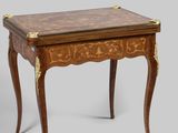 an image of a small table with a drawer on top of it