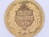 une image représentant une pièce d'or sur laquelle figure le mot « turkey »