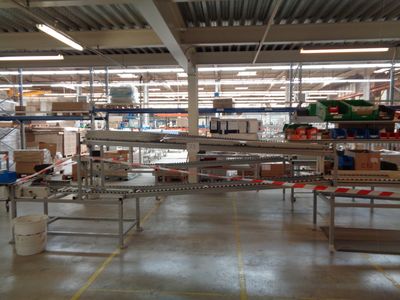 a large warehouse filled with lots of boxes and shelves