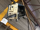 a crane that is hanging from the ceiling of a building