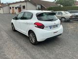 a white car that is parked in a parking lot