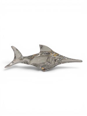an image of a silver plate with a fish on it