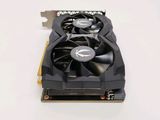 a close up of a video card sitting on top of a white table