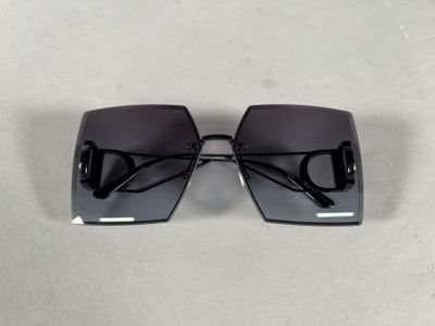 black square sunglasses with black lenses on a white surface