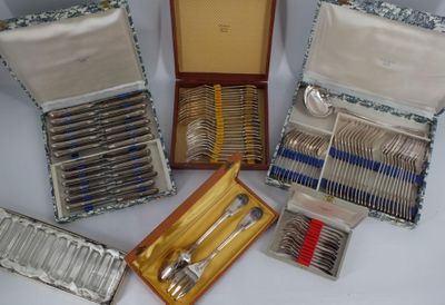a lot of silverware in a case on a table