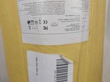 a yellow box with a label on it sitting on a table