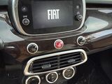 a car dashboard with a digital display in the center