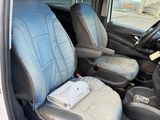 a picture of a van with two seats in it