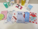 many different types of skin care products laid out on a table
