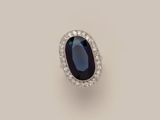 an oval sapphire and diamond ring