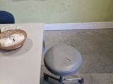 a small table with a bowl of food on it