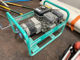 an image of a small engine on a cart