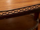 a close up of a table with a glass of wine on it