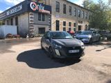 a car parked in front of a building in a parking lot