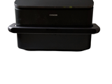 two black containers sitting side by side on a white background