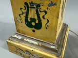 a yellow box with a green design on it