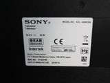 the back of a sony laptop with a white label on it ' s side