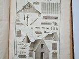 an open book with drawings of buildings and other things on it