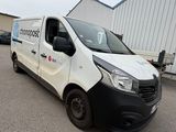 a picture of a white van parked in a parking lot