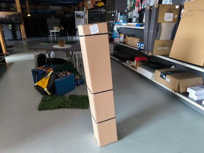 boxes are stacked on top of each other in a store