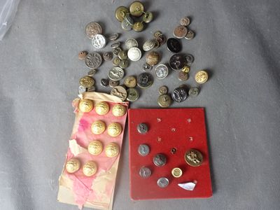 a lot of coins and a book sitting on a table