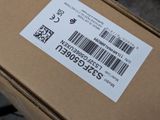 a box with a barcode on it sitting on the ground